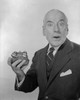 Senior man holding purse with locks Poster Print - Item # VARSAL255418753