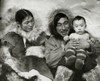 Eskimo couple sitting with their son Poster Print - Item # VARSAL990118173