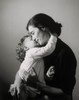 Side profile of a daughter kissing her mother Poster Print - Item # VARSAL2557065
