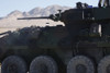 A light armored vehicle fires its 25mm Bushmaster chain gun Poster Print - Item # VARPSTSTK103374M