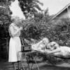 Senior couple relaxing in backyard Poster Print - Item # VARSAL255417544