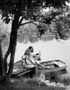 Two teenage girls sitting on a dock Poster Print - Item # VARSAL25527192