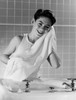 Smiling boy drying face with towel in bathroom Poster Print - Item # VARSAL255418158