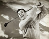 Close-up of a mid adult man swinging a golf club Poster Print - Item # VARSAL2553674