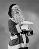 Portrait of Santa Claus holding a list of names and laughing Poster Print - Item # VARSAL255703