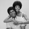 Portrait of a young woman embracing a young man from behind Poster Print - Item # VARSAL2552781
