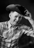 Portrait of smiling man wearing cowboy hat Poster Print - Item # VARSAL255419959