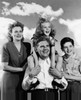 Parents and their children standing Poster Print - Item # VARSAL25517125