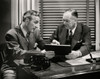 Two businessmen talking in an office Poster Print - Item # VARSAL2553076
