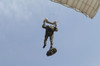 A member of the British Army Pathfinder Platoon prepares to land from a parachute jump Poster Print - Item # VARPSTACH100124M