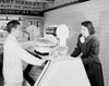 Customer and sales clerk choosing meat in butcher's shop Poster Print - Item # VARSAL255422415