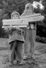 Vintage photograph of boys holding stacks of wood panels Poster Print - Item # VARSAL25516329