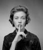 Woman with finger on lips Poster Print - Item # VARSAL255416796