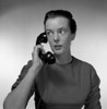 Young woman using telephone Poster Print - Item # VARSAL255417588