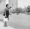Elegant woman on street waving for taxi Poster Print - Item # VARSAL255421936