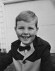 Portrait of smiling boy wearing bow tie Poster Print - Item # VARSAL255419381