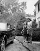 Mother and her children waving to their father Poster Print - Item # VARSAL255918
