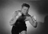Young man in boxing stance Poster Print - Item # VARSAL255418995