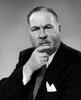 Studio portrait of businessman with hand on chin Poster Print - Item # VARSAL25512312A