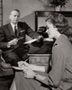Businessman dictating a letter to his secretary in an office Poster Print - Item # VARSAL2555781