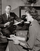 Businessman dictating a letter to his secretary in an office Poster Print - Item # VARSAL2555781