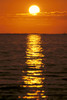 Sunset Reflections On Dark Ocean Water, Sun Ball In Orange Sky PosterPrint - Item # VARDPI2002177
