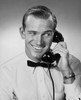 Mid adult businessman talking on telephone Poster Print - Item # VARSAL25548251
