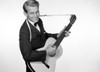 Man playing acoustic guitar Poster Print