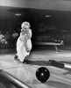 Young adult woman bowling Poster Print - Item # VARSAL2556079