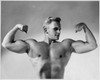 Close-up of a young man flexing his muscles Poster Print - Item # VARSAL25524328