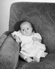 High angle view of a baby girl sitting on a couch Poster Print - Item # VARSAL2552703