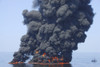 June 9, 2010 - A controlled burn of oil from the Deepwater Horizon oil spill sends towers of fire hundreds of feet into the air over the Gulf of Mexico off the Louisian Coast Poster Print - Item # VARPSTSTK103664M