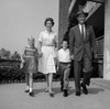 Boy and girl walking with parents outside flats Poster Print - Item # VARSAL255417160B