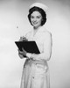 Portrait of a female nurse holding a clipboard Poster Print - Item # VARSAL25516335