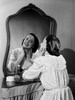 Young woman looking at mirror Poster Print - Item # VARSAL255416771