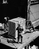 Stevedores loading crate on an industrial ship  New York City  New York State  USA Poster Print - Item # VARSAL25536468