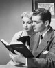 Young couple reading the Bible Poster Print - Item # VARSAL25549075