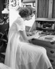 Side profile of a young woman writing a letter Poster Print - Item # VARSAL255909