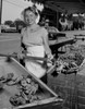 USA  Massachusetts  Essex  Female fishmonger selling Lobsters Poster Print - Item # VARSAL255423305