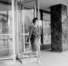 Elegant woman on street Poster Print - Item # VARSAL255421930