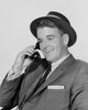 Mid adult businessman talking on telephone Poster Print - Item # VARSAL25548246