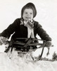 Low angle view of a girl on a sled Poster Print - Item # VARSAL2554079