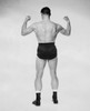 Rear view of a male body builder flexing his muscles Poster Print - Item # VARSAL25524325