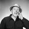 Young man shouting  studio shot Poster Print - Item # VARSAL255417400