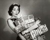 Close-up of a mid adult woman carrying a stack of gifts Poster Print - Item # VARSAL25528995