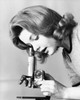 Close-up of a young woman looking through a microscope Poster Print - Item # VARSAL2553890
