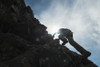 Man scrambling up ridge in the Black Cuillin; Isle of Skye, Scotland PosterPrint - Item # VARDPI2382987