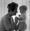 Side view of young woman playing with baby boy Poster Print - Item # VARSAL2559806