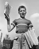 Low angle view of a boy selling newspapers Poster Print - Item # VARSAL25539071