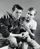 Young man consoling a football player Poster Print - Item # VARSAL25521767